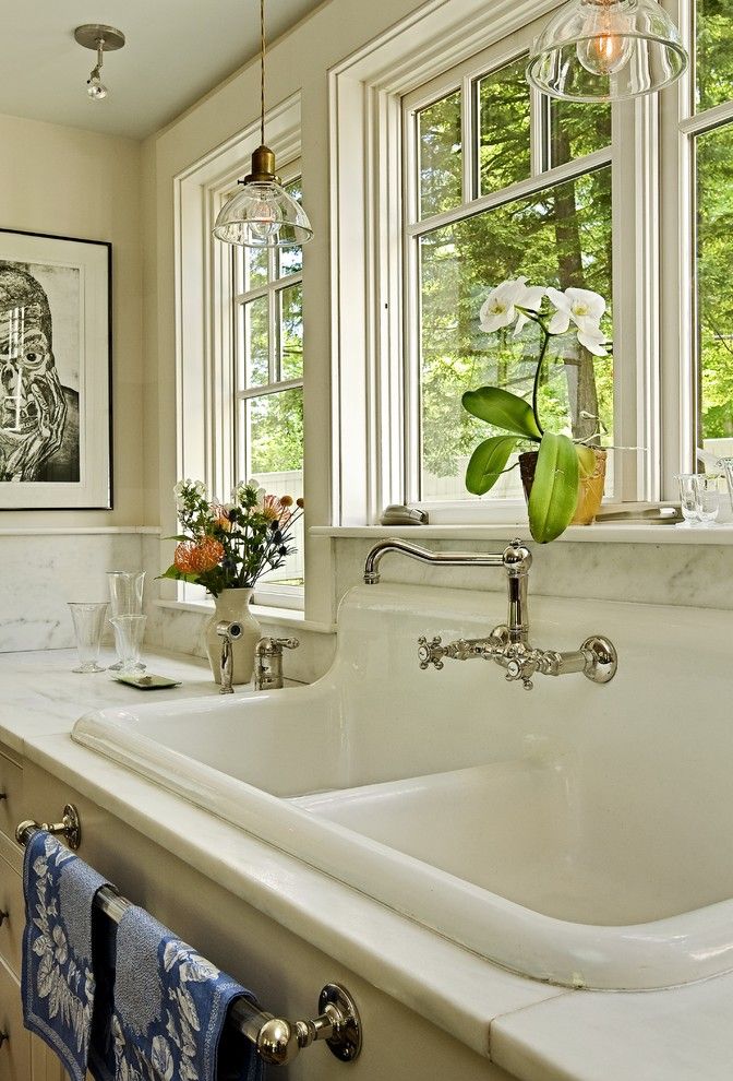 How to Fix a Garbage Disposal for a Traditional Kitchen with a White Kitchen and Repurposing Salvaged Sink by Smith & Vansant Architects Pc