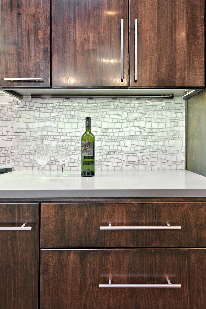 How to Install Backsplash for a Contemporary Kitchen with a Flat Panel Cabinets and Kitchen After by Realty Restoration, Llc