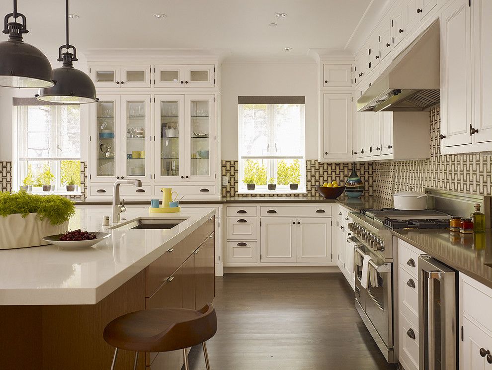 How to Organize Kitchen Cabinets for a Traditional Kitchen with a White Kitchen and Baker Kitchen by Steven Miller Design Studio, Inc.