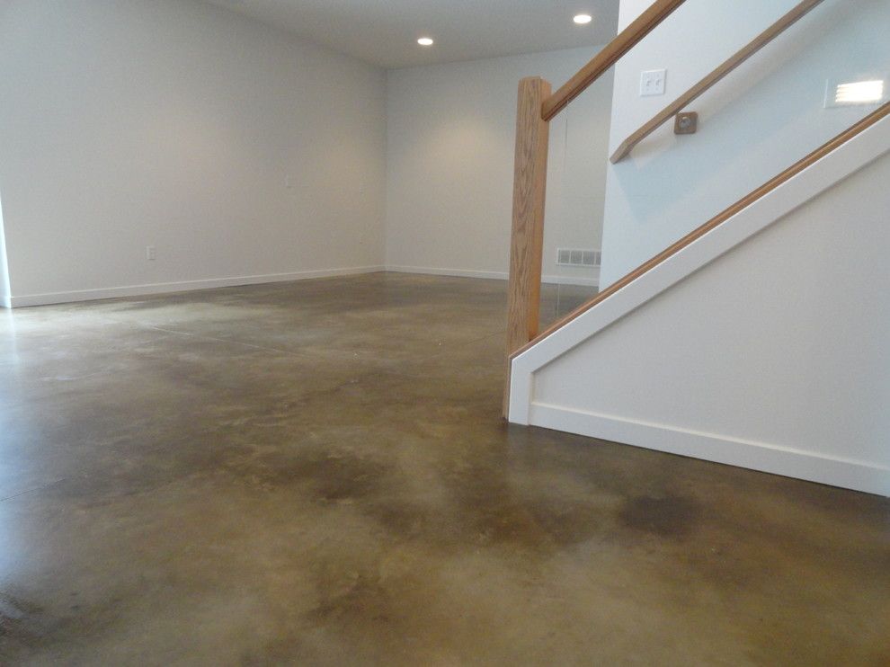 How to Stain Concrete Floors for a Modern Basement with a Stained Basement Floor and Stained Concrete Basement Floor by Dancer Concrete Design