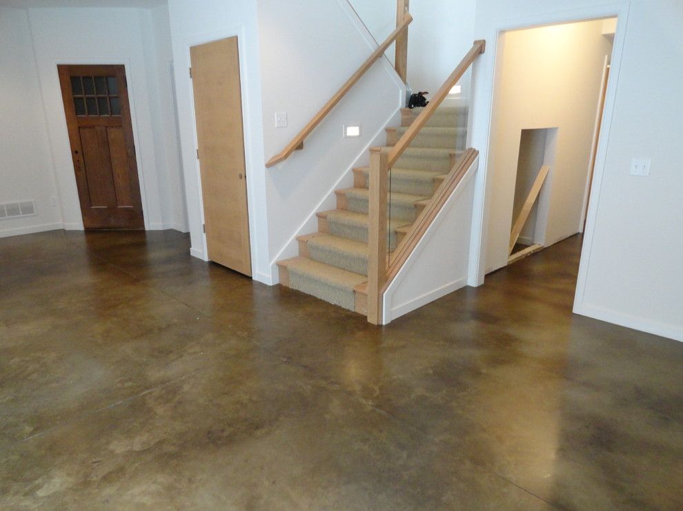 How to Stain Concrete Floors for a Traditional Basement with a Dyed Concrete and Stained Concrete Basement Floor by Dancer Concrete Design