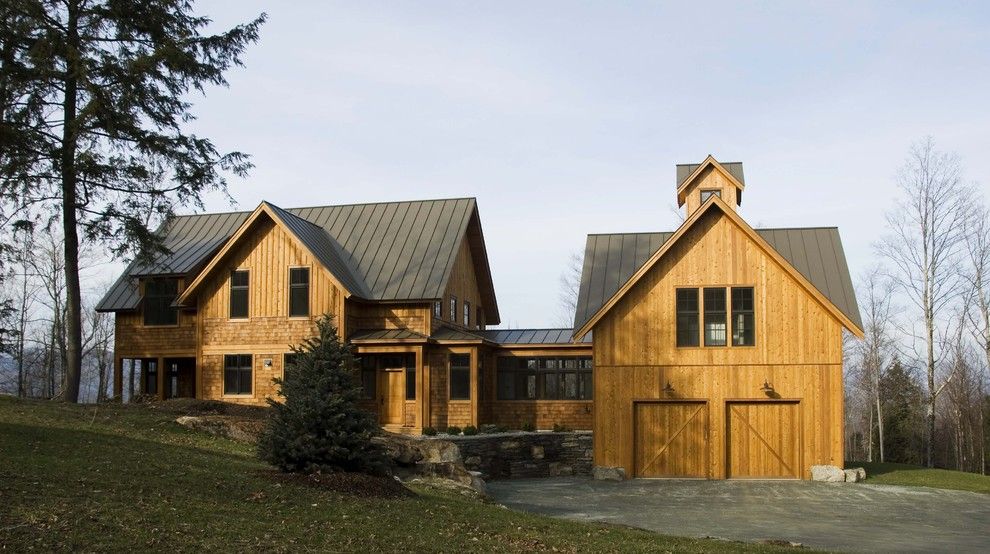 Hurricane Proof House for a Farmhouse Exterior with a Lantern and Points North by Birdseye Design