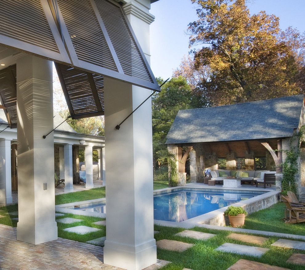 Hurricane Proof House for a Traditional Pool with a Pool House and Stone Residence 1 by Norris Architecture