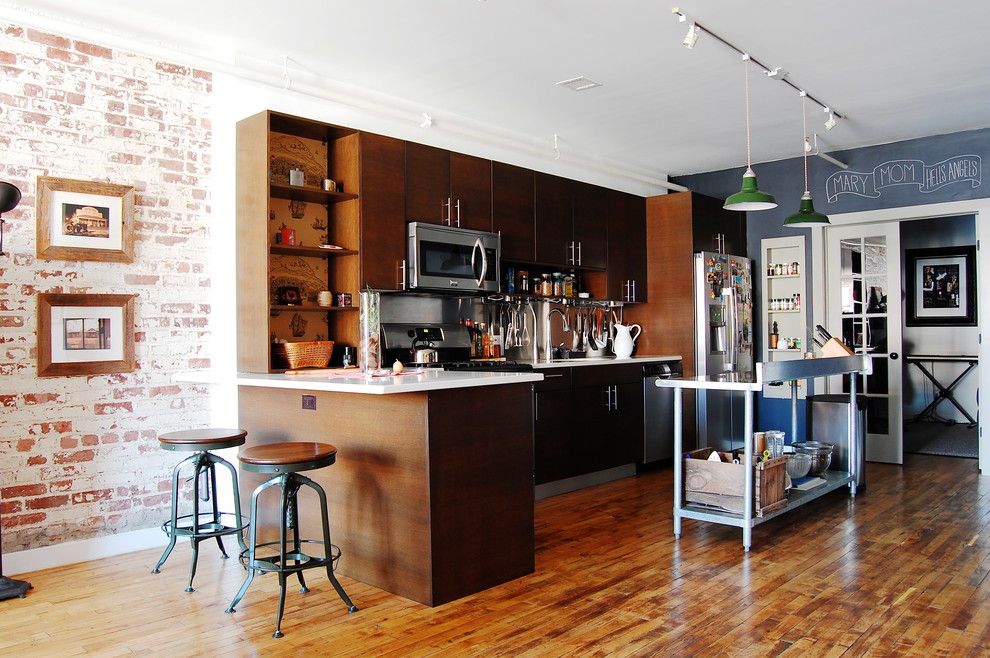 Icestone for a Industrial Kitchen with a Flat Panel Cabinets and My Houzz: Textiles Charm an Open Brooklyn Loft by Corynne Pless