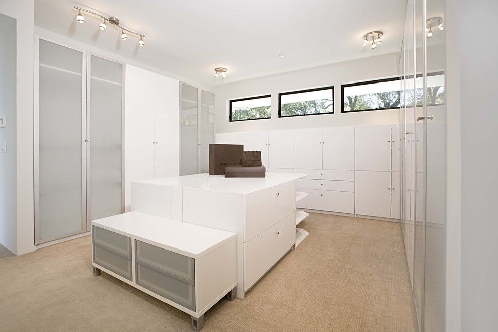 Ikea Pax System for a Contemporary Closet with a White Room and Dressing Room by Mark English Architects, Aia