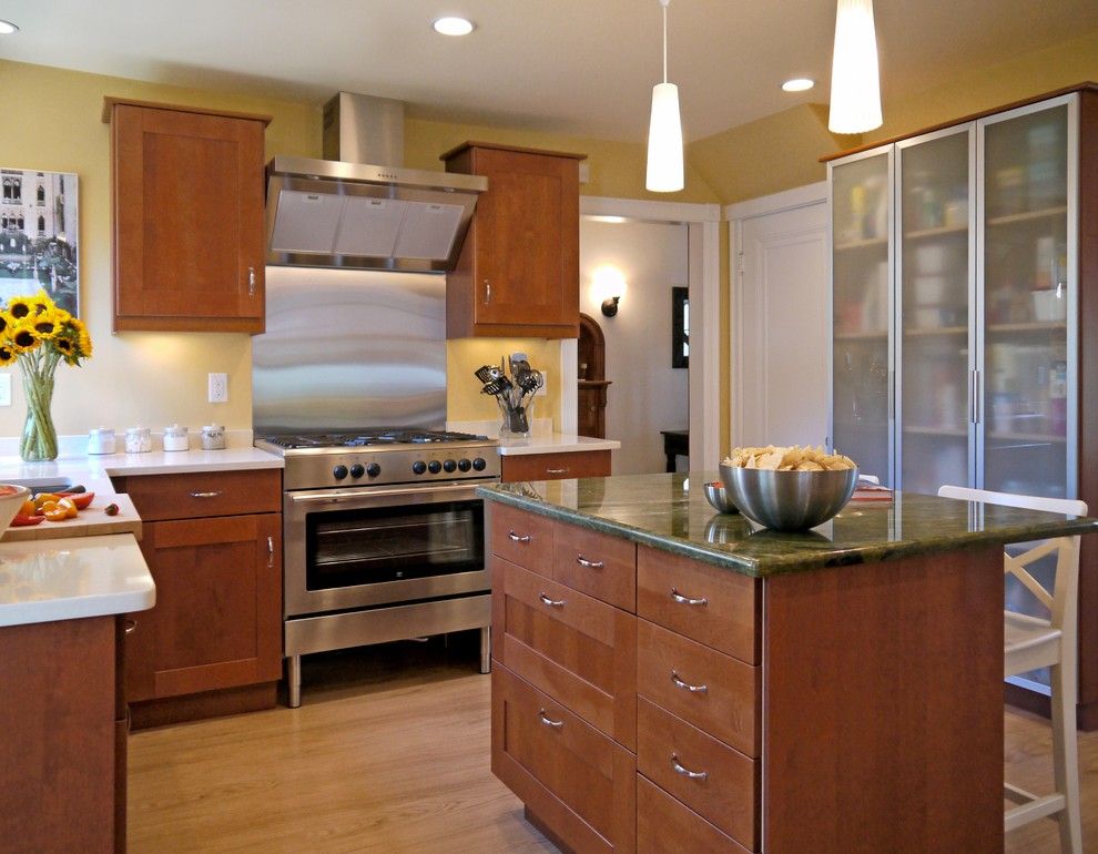 Ikea Quartz Countertops for a Contemporary Kitchen with a Wood Cabinets and A&e Tv Makeover by Cw Design, Llc