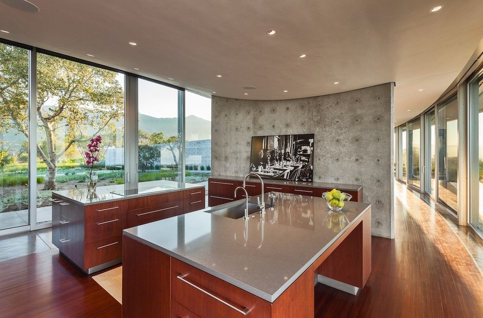 Ikea Quartz Countertops for a Modern Kitchen with a Wood Floor and Kurth Residence by Neumann Mendro Andrulaitis Architects Llp