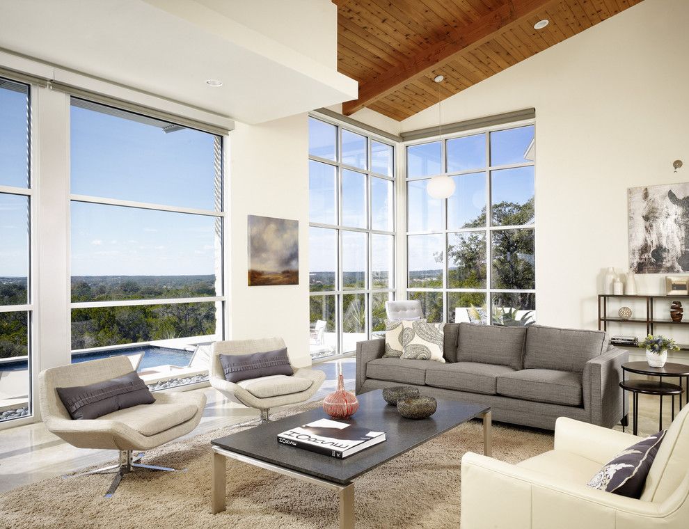 Ikea Swivel Chair for a Modern Living Room with a Wood Ceiling and Wimbereley Retreat by 3 Fold Design Studio