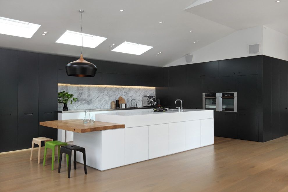 Illuminations Lighting for a Contemporary Kitchen with a Wood Flooring and Masons Ave Kitchen by Jessop  Architects