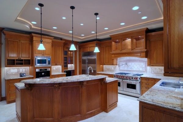 Illuminations Lighting for a Traditional Kitchen with a Stone and Collection by Viscusi Builders Ltd.