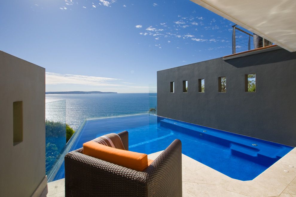 Infinity Edge Pool for a Modern Pool with a Blue and Whale by Peter Glass & Associates