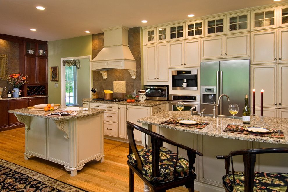 Inset Cabinets for a Traditional Kitchen with a Two Islands Hardwood Floors and Spectacular Renovation by Kitchen and Bath World, Inc