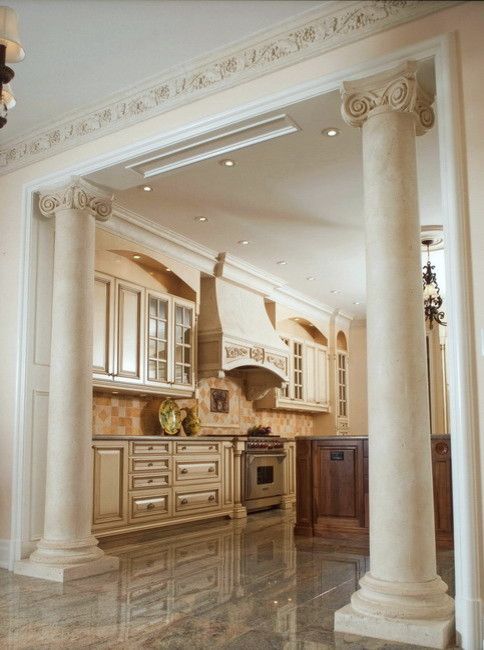 Ionic Columns for a Traditional Kitchen with a Cast Stone Columns and Ionic Marble Columns in Kitchen by Marvelous Marble Design Inc.