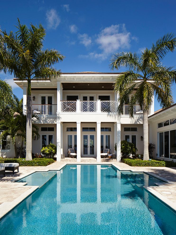 Islander Pools for a Beach Style Pool with a Hip Roof and Blue Crush by Jma Interior Design