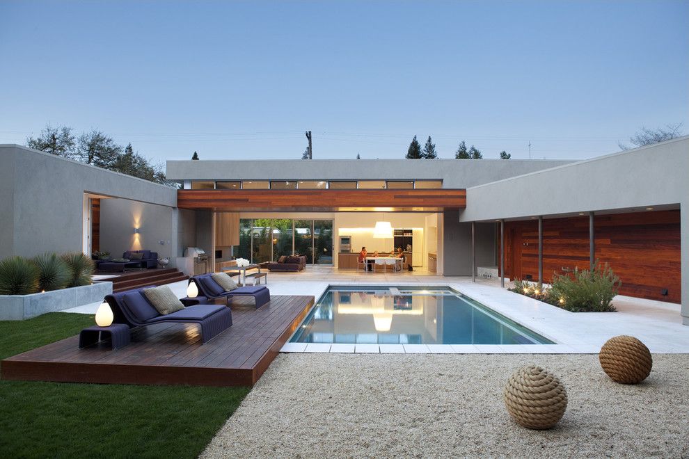 Islander Pools for a Modern Pool with a Steps and Outdoor Living by Dumican Mosey Architects