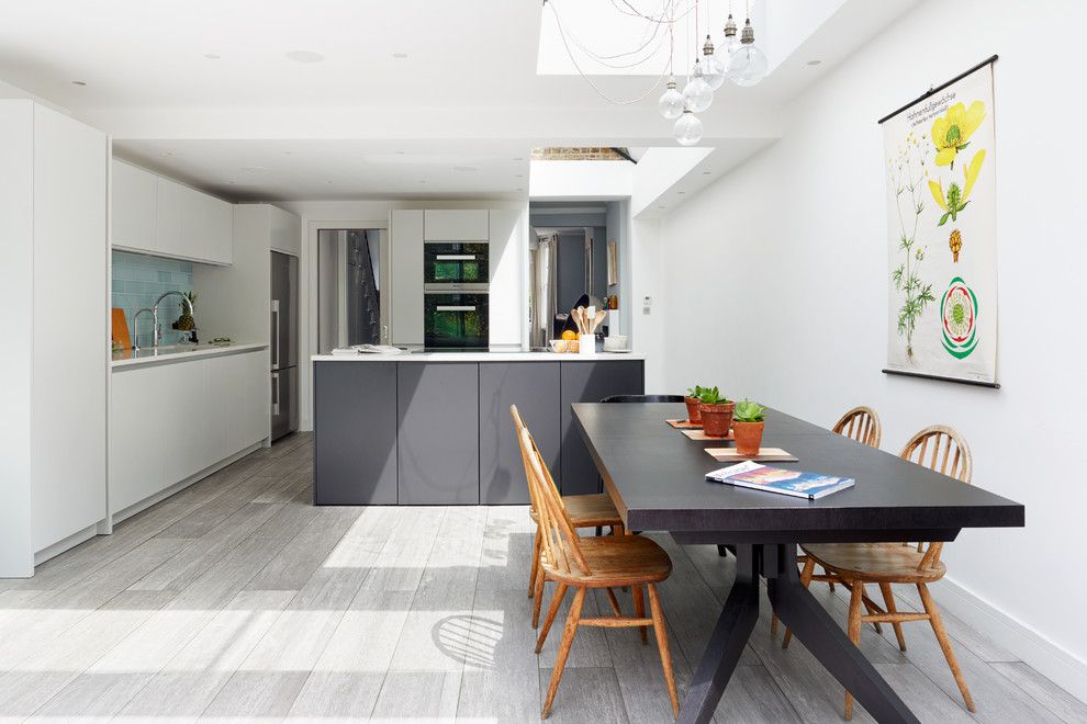 Issis for a Contemporary Dining Room with a Blue Splashback and Rush Hill Road by Granit Chartered Architects