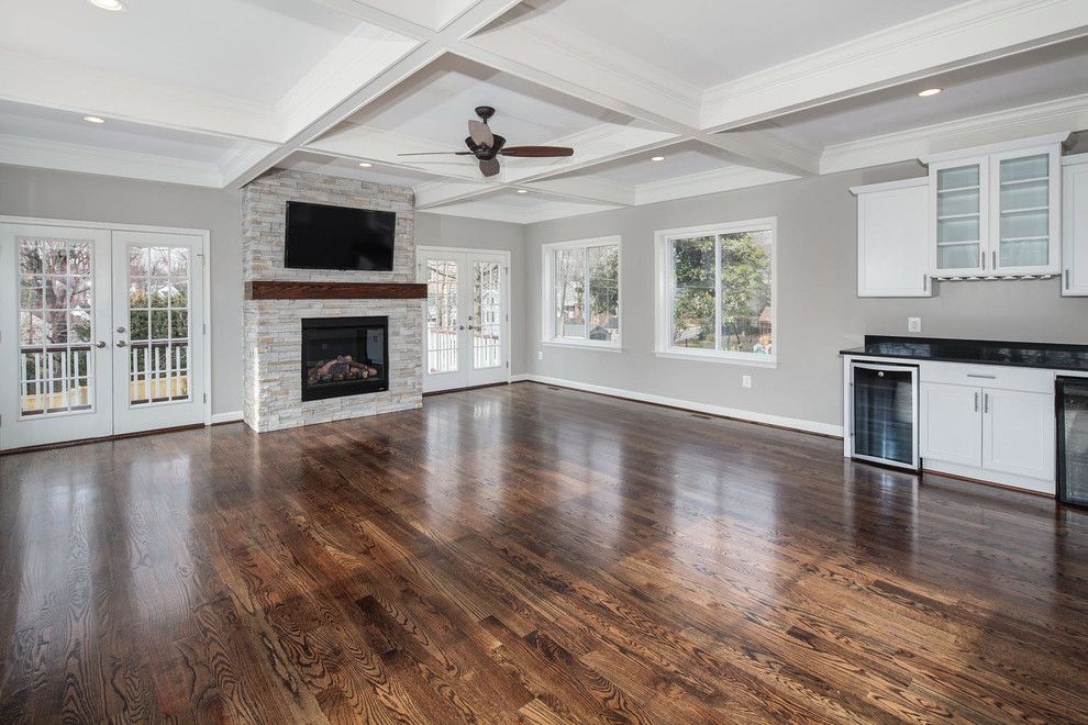 Jacobean Stain for a Transitional Family Room with a Walls Painted Gray and Contemporary Custom Home, Family Room by Classic Cottages Llc