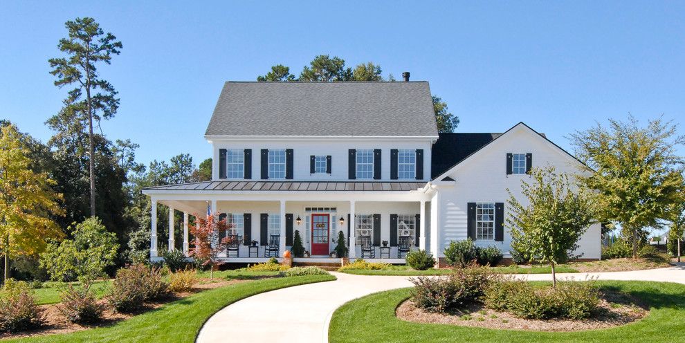 James Hardie Building Products for a Farmhouse Exterior with a Covered Porch and Farm House by Bergeron Custom Homes, Llc