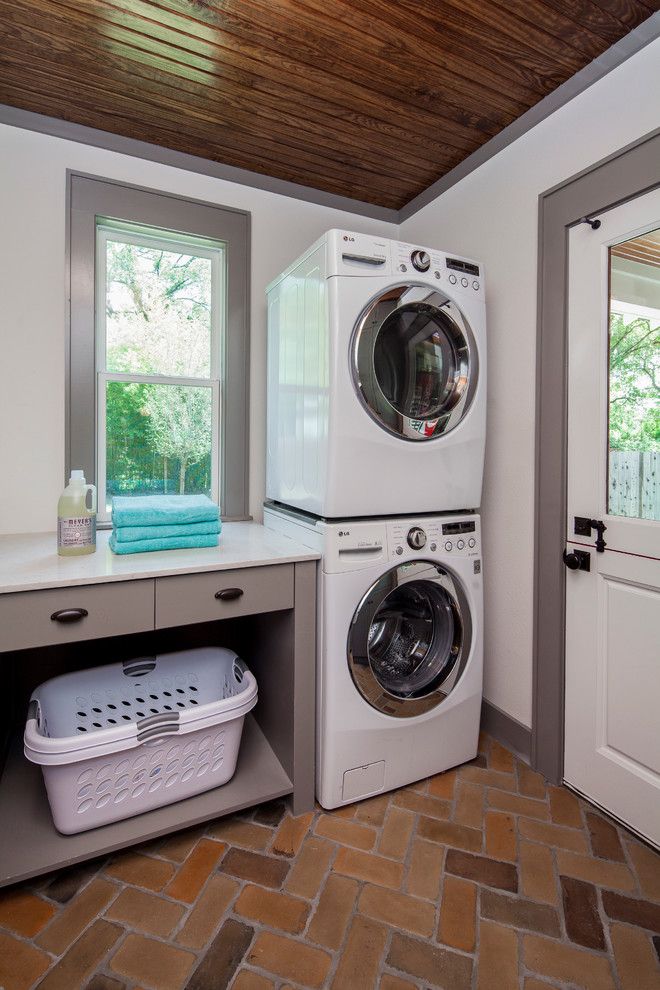 Jeld Wen for a Transitional Laundry Room with a White Countertop and Craftsman Revived by Cg&s Design Build