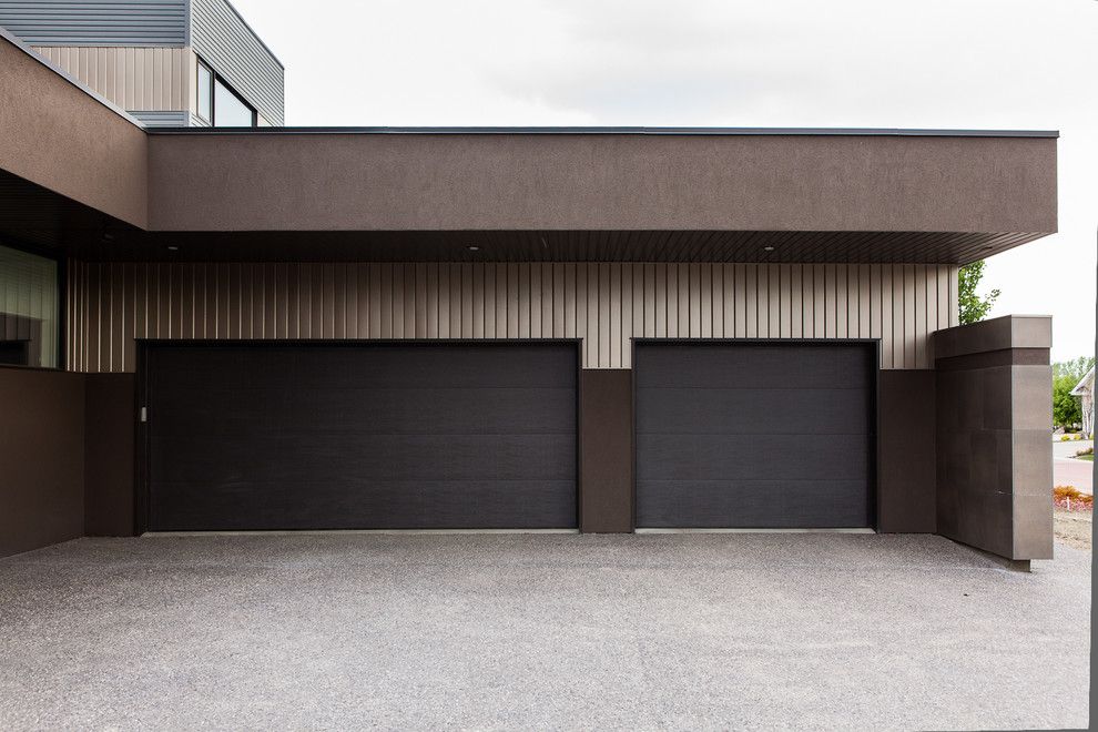 Jen Weld Doors for a Modern Garage with a Earth Tone Colors and Wolf in the Willows by Habitat Studio