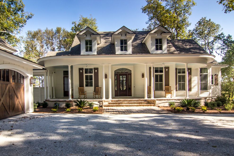 Jenkins Brick for a Traditional Exterior with a Sago Palm and Riordan by Allen Patterson Residential