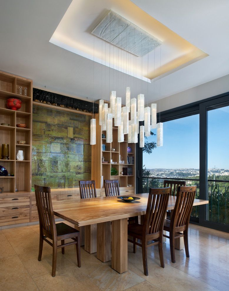 Jesco Lighting for a Contemporary Dining Room with a Wood Dining Chairs and Shakúff by Shakuff