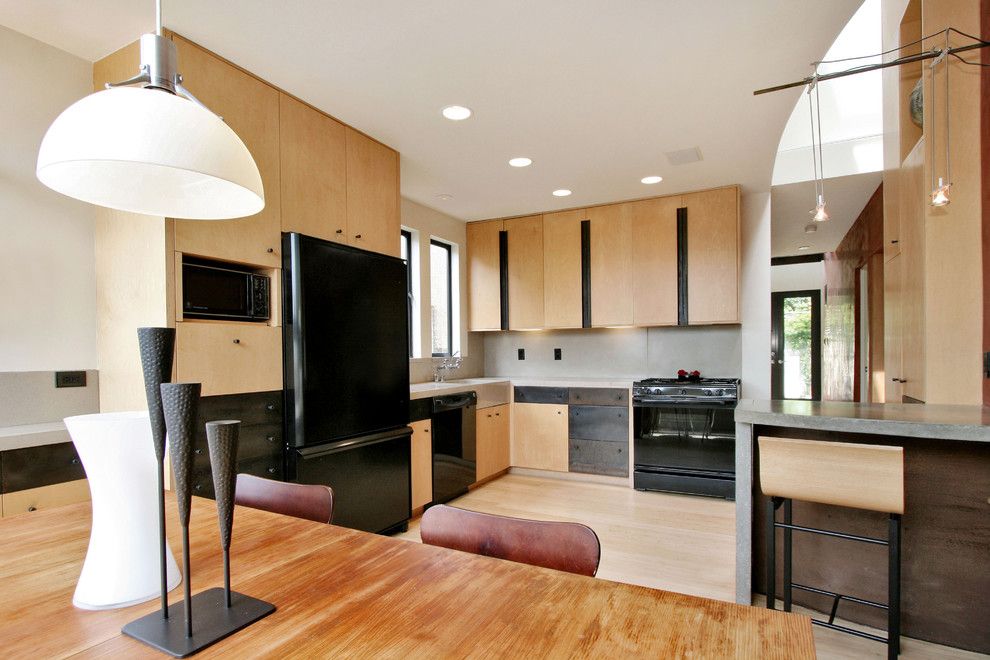 Jesco Lighting for a Modern Kitchen with a Light Wood Barstool and Parlette Residence by Wa Design Architects