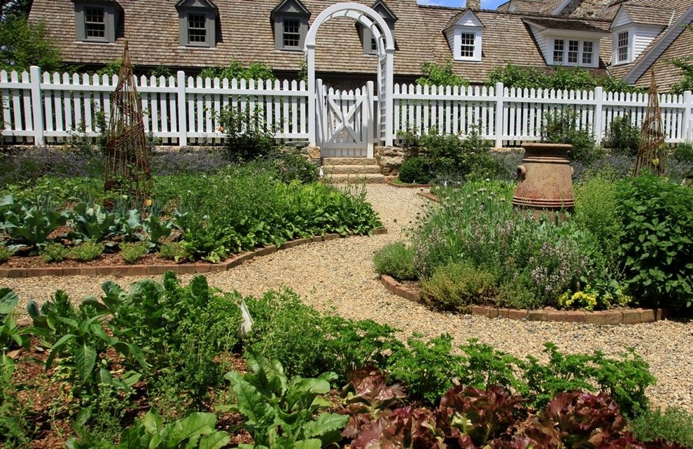 Jung Garden Center for a Traditional Landscape with a Stone Wall and Vegetable & Herb Garden by the Todd Group