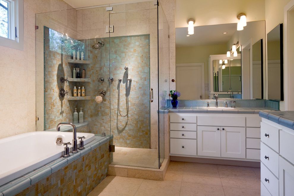 Ken Caryl Glass for a Contemporary Bathroom with a Tile Flooring and South Austin Bungalow by Cravotta Interiors