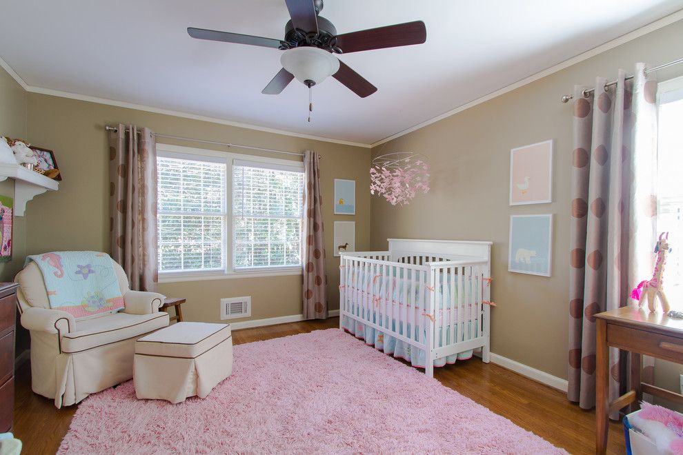 Kick Pleat for a Traditional Nursery with a Ceiling Fan and Buckhead 3 by Abbey Construction Company, Inc.