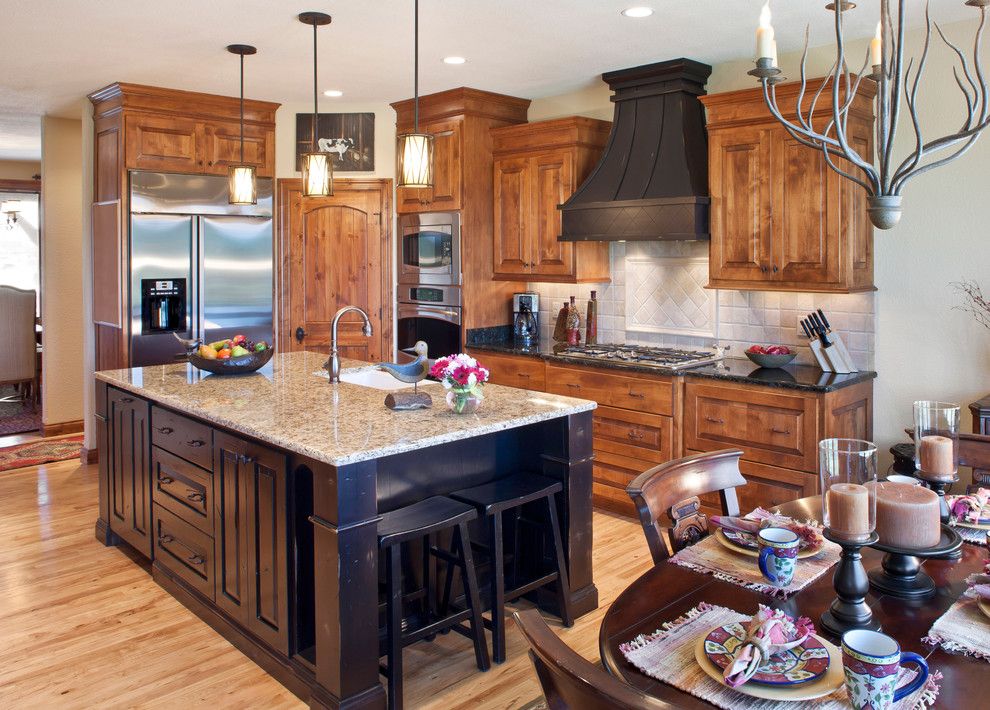 Knotty Alder Cabinets for a Traditional Kitchen with a Kitchen Islands and the Aberdeen by Carstensen Homes