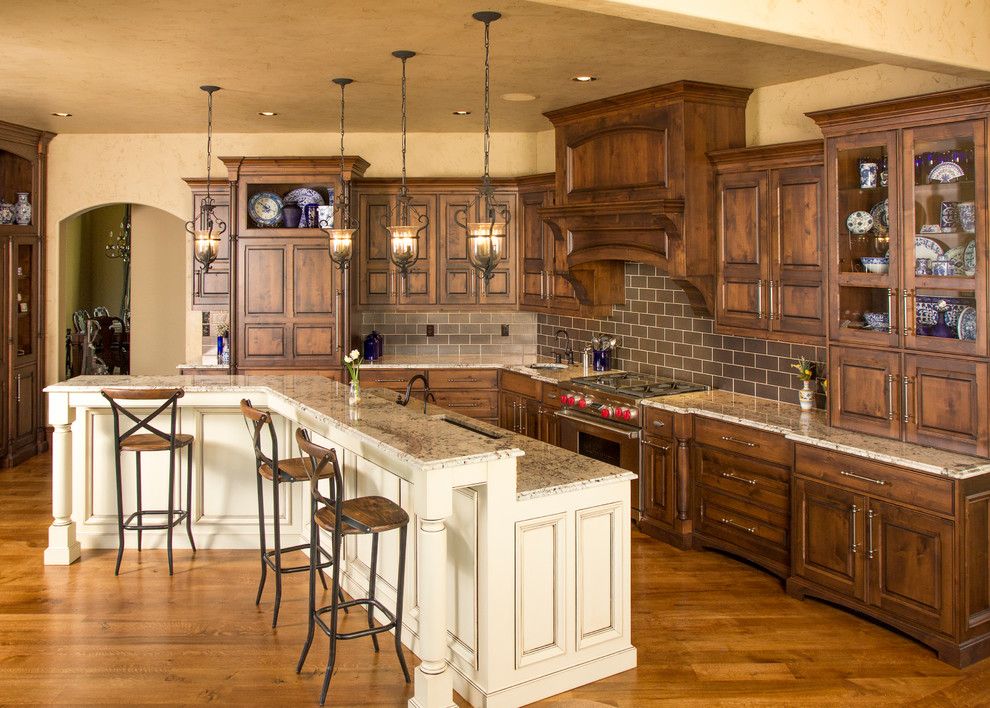 Knotty Alder Cabinets for a Traditional Kitchen with a Large Island and Beaded Inset Cabinetry by Wende Woodworking Llc