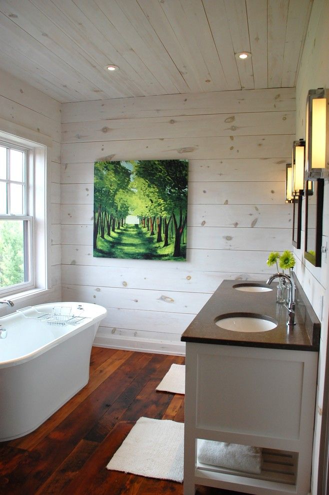 Knotty Pine for a Contemporary Bathroom with a Freestanding Tub and Kate Davidson Design by Kate Davidson Design Inc