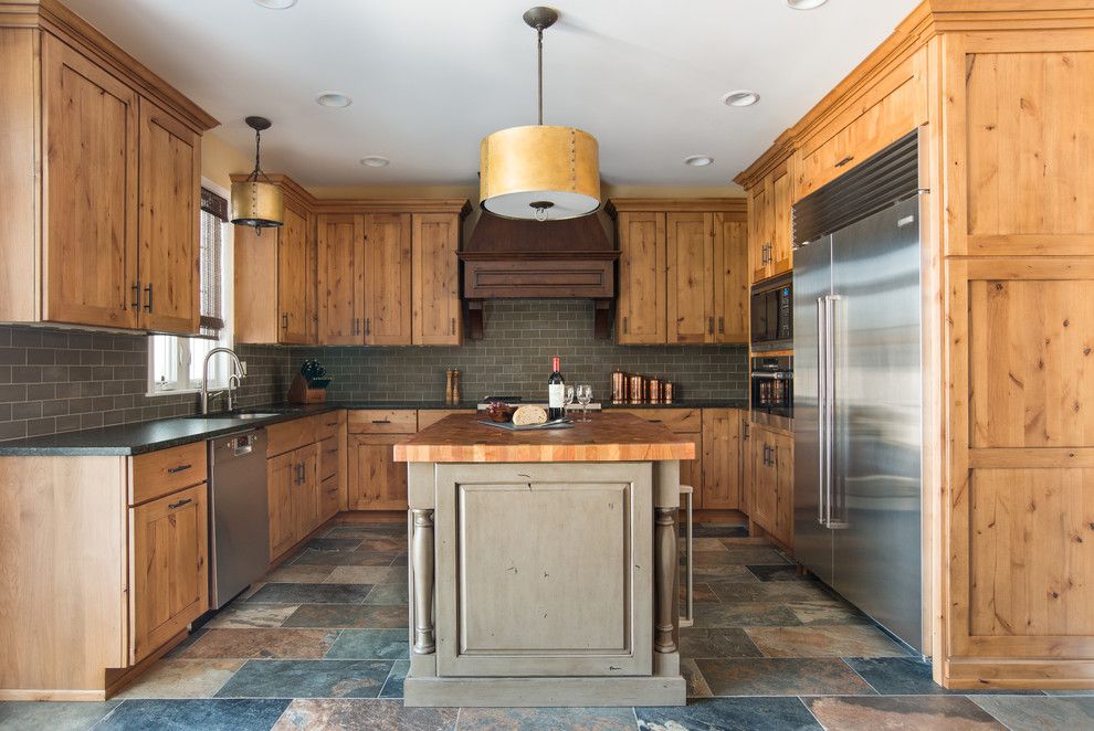 Knotty Pine for a Rustic Kitchen with a Slate and Warm and Rustic Remodel by Kristin Petro Interiors, Inc.