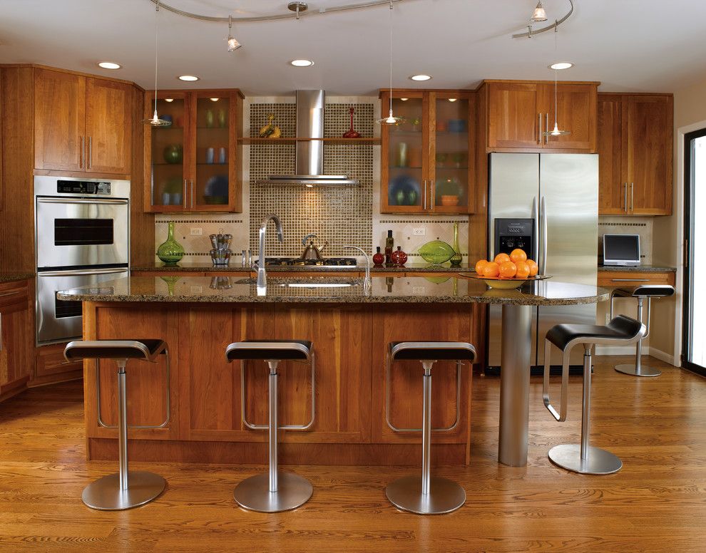 Kraus Flooring for a Contemporary Kitchen with a Flat Panel and Kitchen Cabinets by Capitol District Supply