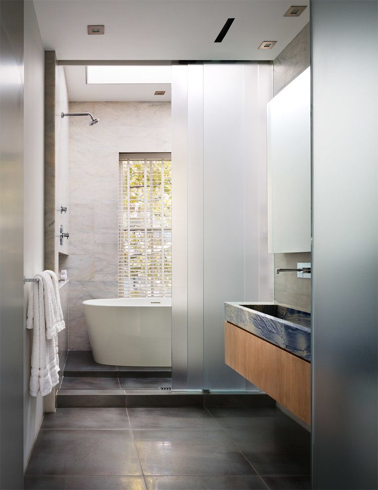 Kraus Flooring for a Transitional Bathroom with a Large Format Floor Tiles and Upper East Side Townhouse by Dineen Architecture + Design