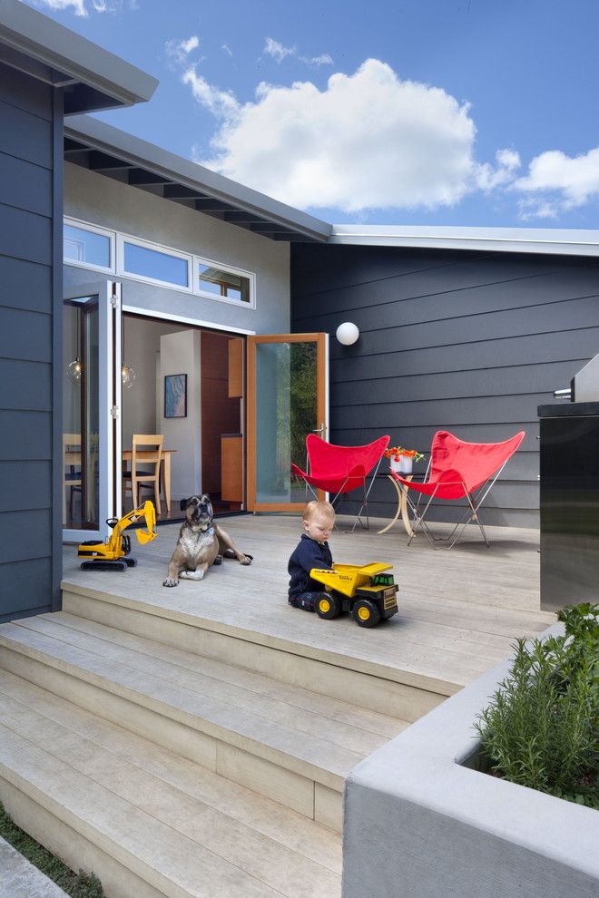 La Cantina Doors for a Modern Deck with a Dark Gray Exterior and Cloud Residence by Ana Williamson Architect