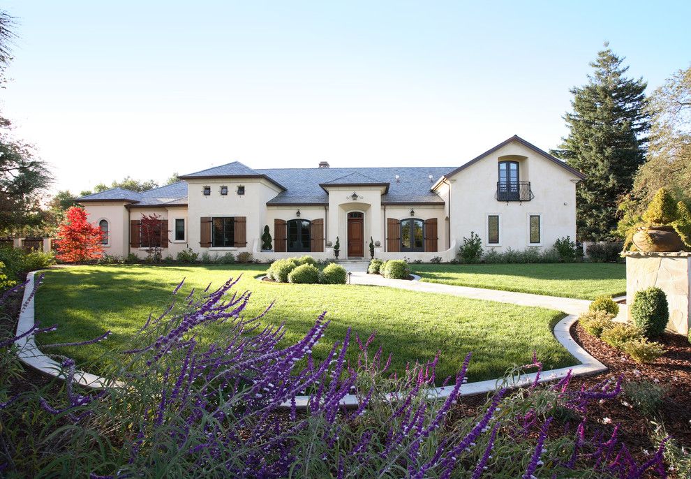 La Habra Stucco for a Mediterranean Exterior with a Beige Exterior and Saratoga European French Inspired by Culbertson Durst Interiors