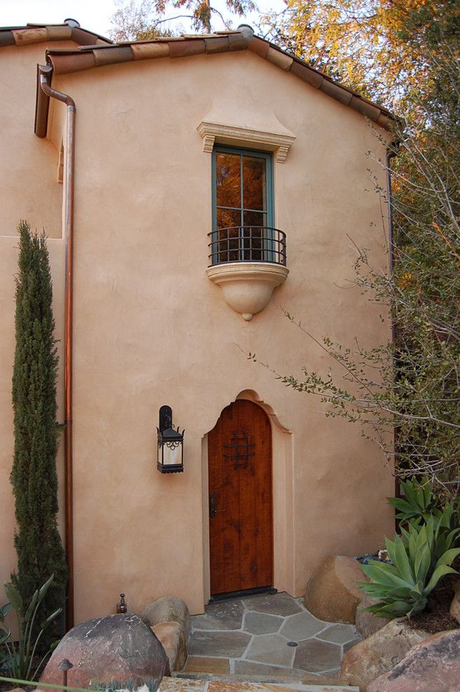 La Habra Stucco for a Mediterranean Exterior with a Tile Roof and El Volver by Sterling Huddleson Architecture