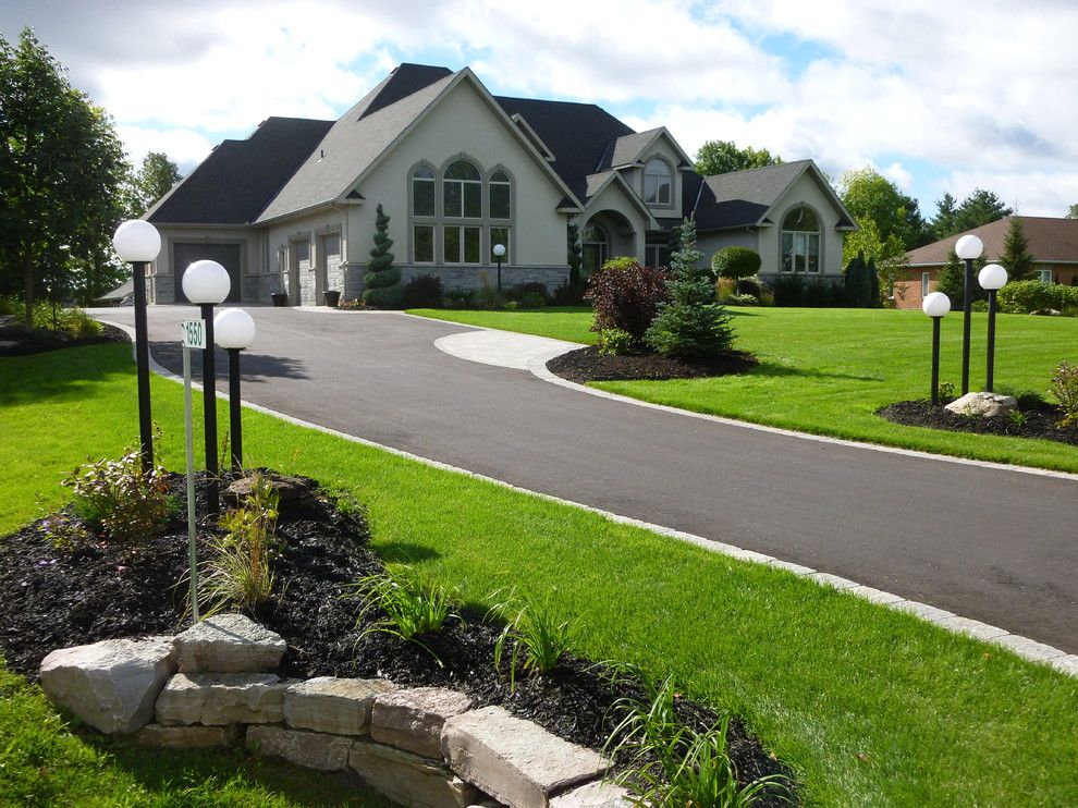 Lakeland Yard and Garden for a Contemporary Landscape with a Retaining Walls and Lakeland Estates by Mackinnon Reid & Associates Inc.