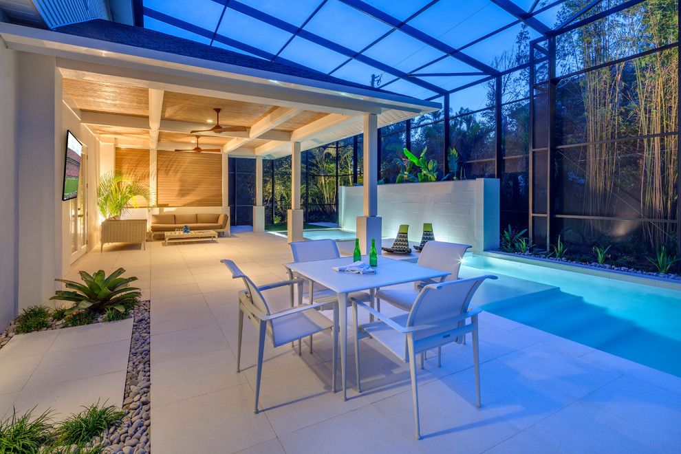 Lanais for a Contemporary Patio with a Glass Ceiling and Pool Patio Renovation with Pavilion by Dwy Landscape Architects
