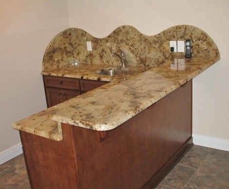 Lapidus Granite for a Traditional Basement with a Lapidus Granite and Flynn Basement by the Granite Centre