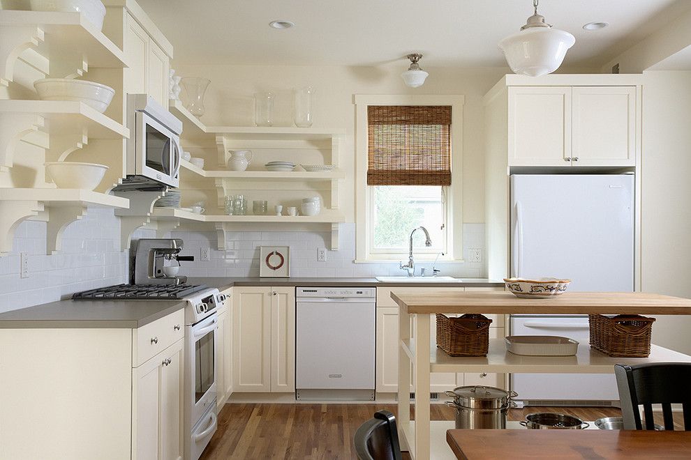 Lavalley Building Supply for a Traditional Kitchen with a Wood Flooring and Quaint Painted Kitchen with Open Shelving by Erotas Building Corporation