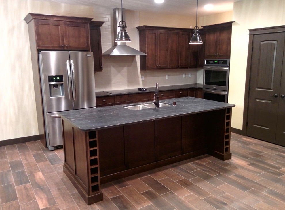 Legacy Cabinets for a Craftsman Kitchen with a Mantle and Private Residence Kennewick, Wa by Legacy Mill & Cabinet Nw Llc