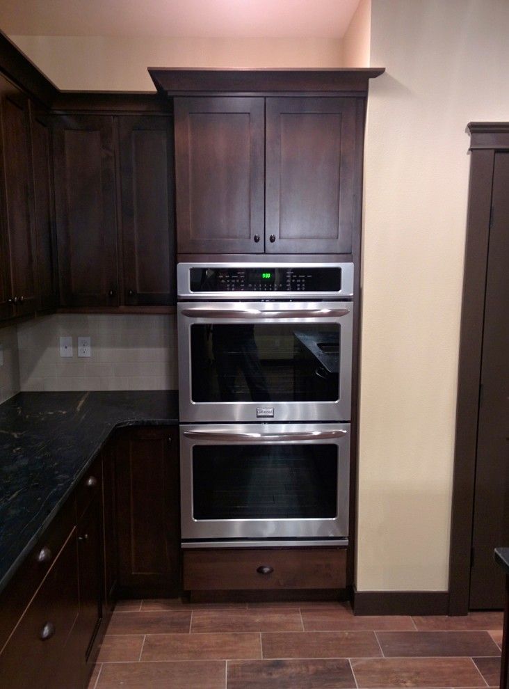 Legacy Cabinets for a Craftsman Kitchen with a Mantle and Private Residence Kennewick, Wa by Legacy Mill & Cabinet Nw Llc