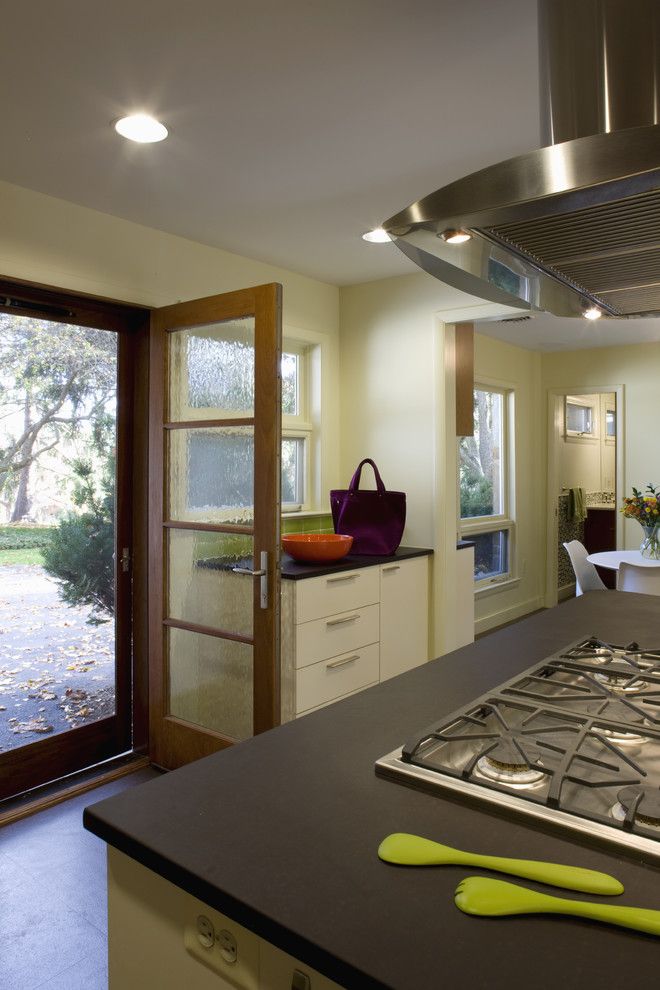 Lemieux Doors for a Modern Kitchen with a Green and Mid Century [Re]modern by Brennan + Company Architects