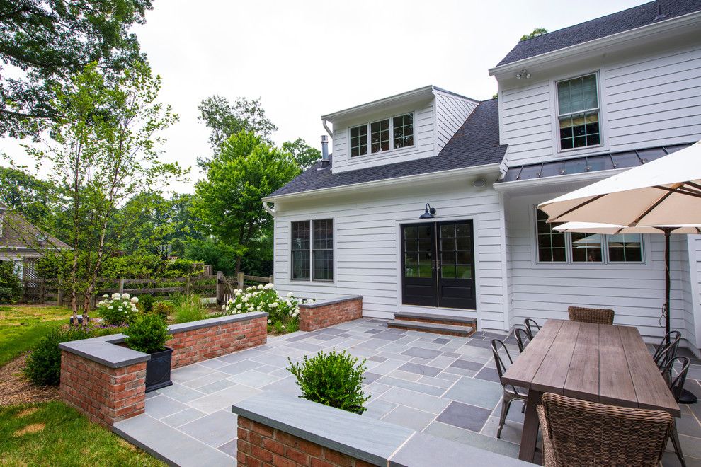 Lemieux Doors for a Traditional Patio with a Industrial Dining Table and White Hall Renovations by Smithouse