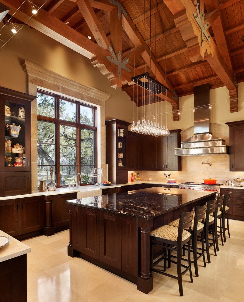 Light Bulb Disposal for a Contemporary Kitchen with a Cathedral Ceiling and Kelian Court by Braswell Architecture, Inc.