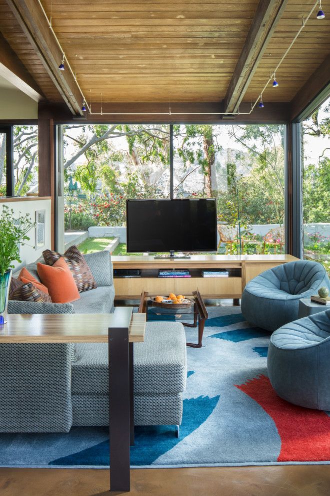 Ligne Roset for a Contemporary Family Room with a Exposed Beams and Tigertail Ridge   Architectural by Susan Jay Design