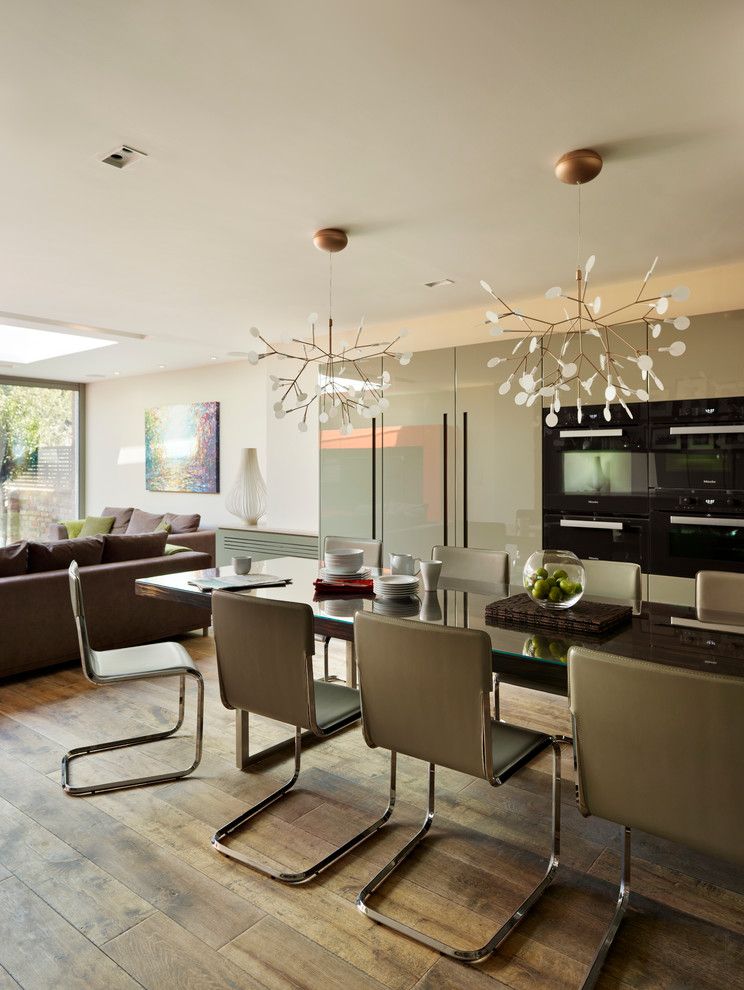 Ligne Roset for a Contemporary Kitchen with a Wall Ovens and Wandsworth Common by Ensoul Interior Architecture